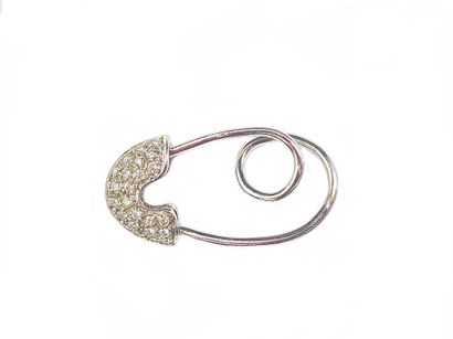 PIN featuring an 18K white gold safety pin...