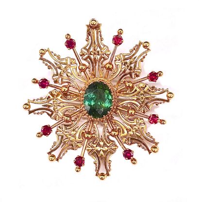 null BROCHE/PENDENTIF orné d'une tourmaline, de pierre rouge et de granules d'or...