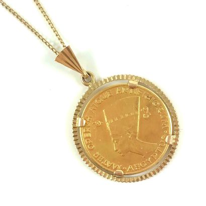 PENDANT / decorated with a gold coin featuring...