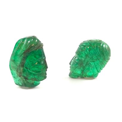 null 
RARE EMERALDS

presenting the profiles of a man and a woman. 

Woman's head...