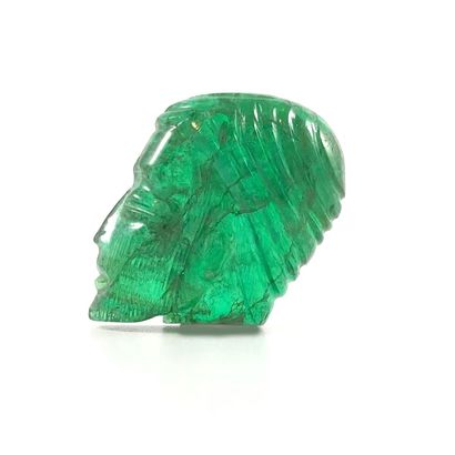 null 
RARE EMERALDS

presenting the profiles of a man and a woman. 

Woman's head...