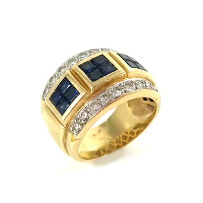 null RING presenting three squares of calibrated sapphire, surrounded by two lines...
