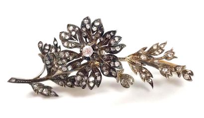  ASPEN BROOCH decorated with a flower on...