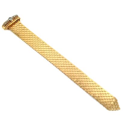 null 1940's BELT BRACELET featuring a scale-like mesh, with a buckle adorned with...