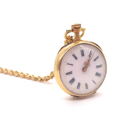 null POCKET WATCH with a white dial, Roman numerals. Backside decorated with foliage....