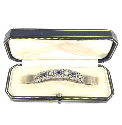 null BRACELET holding a barrette set with sapphires and old-cut diamonds, in a geometrical...