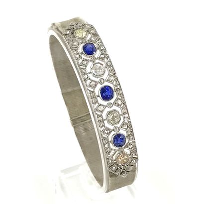 null BRACELET holding a barrette set with sapphires and old-cut diamonds, in a geometrical...