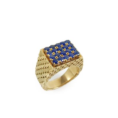 null MAUBOUSSIN HORSE RING adorned with a pavement of sapphires in rectangular form....