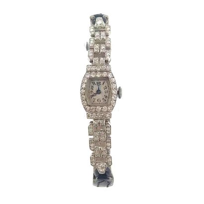 null MONTRE ART DÉCO montre bracelet pour femme, en or gris 18k et diamants taille...