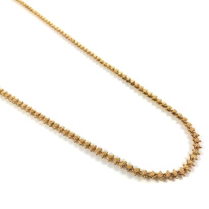  CHAIN decorated with granulated motifs. Mounted in 18K yellow gold. Length : 76...