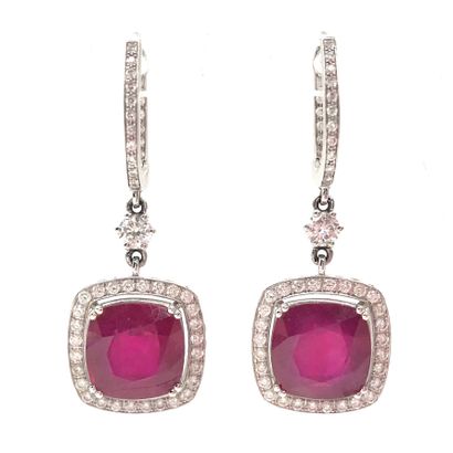 null PAIR OF EARRINGS holding square cushion rubies, set with brilliant-cut diamonds....