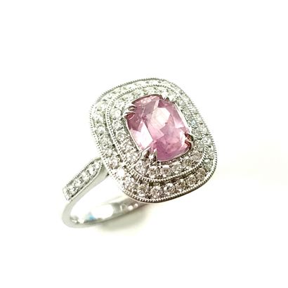 RING set with a 2.11 carat cushion sapphire,...