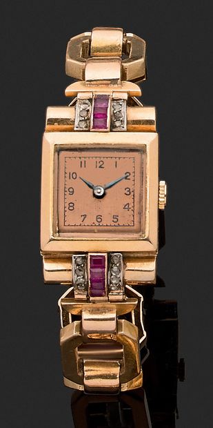 null WATCH 1950's square case, gilded back, adorned at both ends with a line of calibrated...