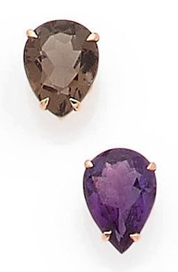 null INTERCHANGEABLE RING set with a pear-shaped center stone (rhodolite, amethyst...