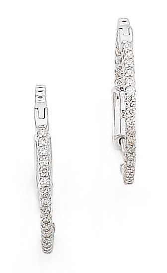 null PAIR OF CREOLES set with 68 brilliant-cut diamonds. Mounted in 18K white gold....