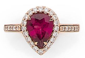 null INTERCHANGEABLE RING set with a pear-shaped center stone (rhodolite, amethyst...