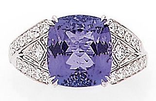 null RING holding a 5.38 carat cushion-cut tanzanite, in a double body, set with...