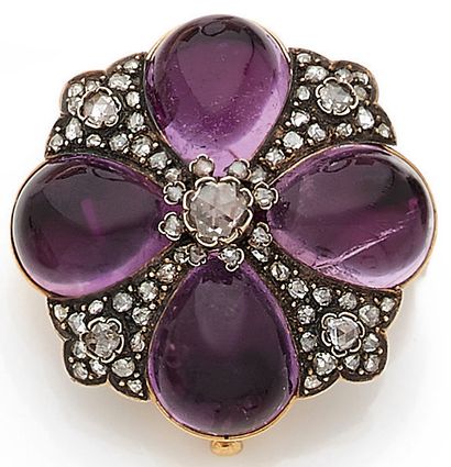 null IMPORTANT BROCHURE with a four-lobed motif, holding four pear-shaped amethyst...