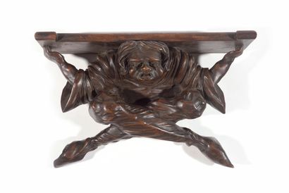  Small stained wood console with a grinning character. End of the 19th century. H...