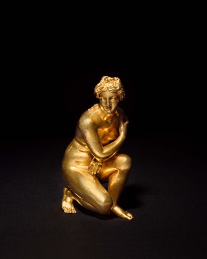 null Gilded bronze figure of the crouching Venus after the Antique (wear), with a...