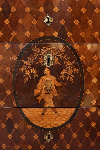 null LARGE COMMODE in marquetry of trellises, of moved form, the front opening with...