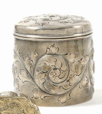 null Round silver box covered decorated in repoussé of large volutes of acanthus...