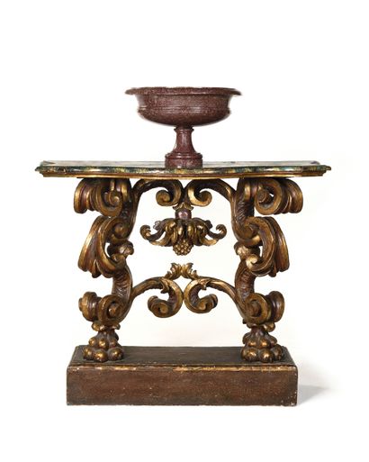 null A walnut or poplar wood CONSOLE, partly carved with gilding, base in the form...