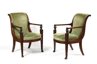 null Pair of mahogany armchairs with reversed back, mahogany veneer and black patina,...