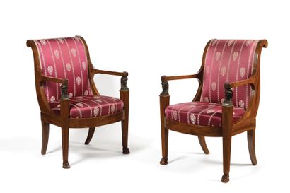 null A Pair of mahogany, mahogany veneer and stained wood overturned back armchairs,...