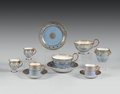 SEVRES Two porcelain cups with gold decoration...