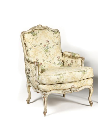 null A moulded, carved and painted beechwood shepherd's chair with a flat back decorated...