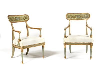 null A Pair of armchairs with scrolls and cameos in the antique style, the armrests...