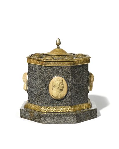 null An octagonal grey granite and ormolu ENCRIBER decorated with profiles in relief...