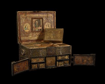 null CHEST made of cut and engraved iron, embossed sheet metal and gilt leather,...