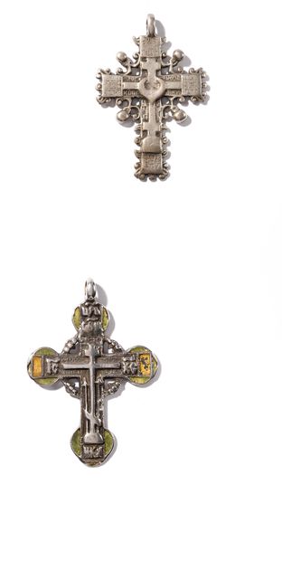 null BATCH OF TWO CROSSES

Engraved silver, enamel

Russia, 18th-19th century

6.3...