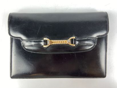  GIORGIO GUCCI 
Black box clutch bag, snap fastener decorated with gilded metal curb...