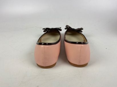  TODS 
Pair of pale pink leather ballerinas with chocolate patent leather trim, fabric...