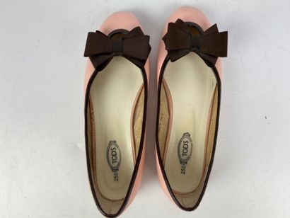  TODS 
Pair of pale pink leather ballerinas with chocolate patent leather trim, fabric...