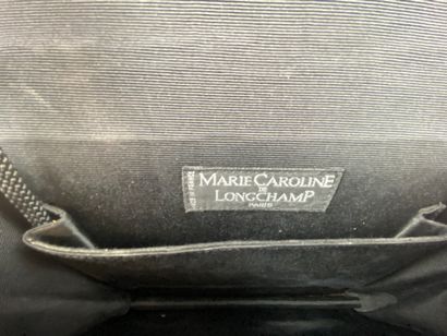  MARIE CAROLINE DE LONGCHAMP 
Black suede clutch bag, snap closure with gold metal...