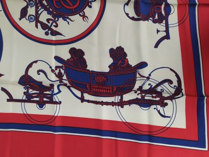  HERMES PARIS 
Silk square decorated with blue carriages with red borders. 
(pulled...