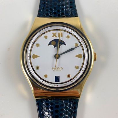 null 
SWATCH

Circa 1990.

Ref: GX709.

C.E.O. - Swatch Lune" wristwatch.

Quartz...