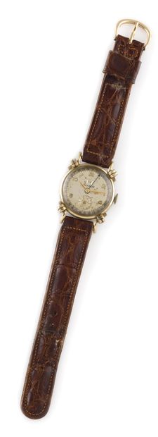  BENRUS 
Vers 1940. 
Réf : 236491 
Montre bracelet plaqué or 10K double quantième,...