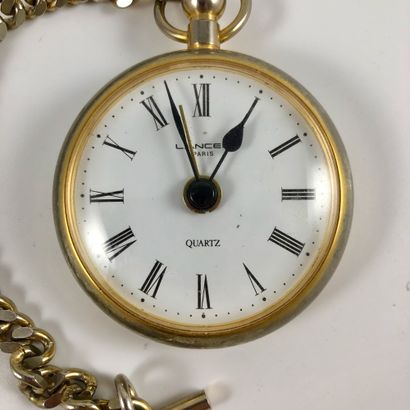 null LANCEL PARIS. CIRCA 1990. Gilt brass clock. Roman numerals index. Pear and leaf...
