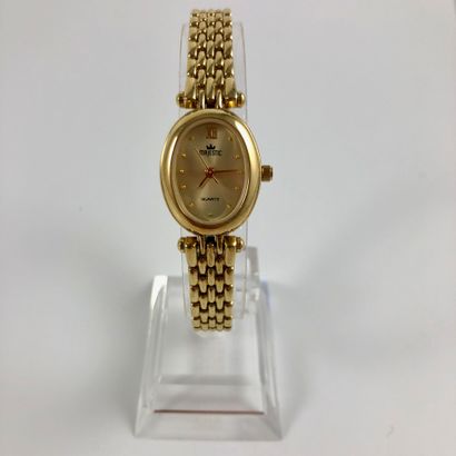 null MAJESTIC QUARTZ : Oval gold-plated watch. Applied index points. Gold-plated...