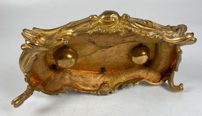 null An ormolu and chiselled ormolu writing case with two covered cups. Louis XV...