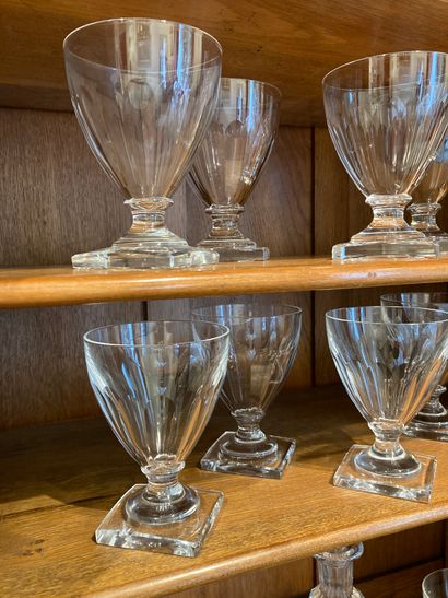  SET OF cut crystal glasses, square bases comprising: - Eighteen goblets - Seventeen...