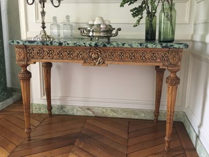  A Pair of CONSOLES in natural wood, moulded and carved with flowers and interlacing...