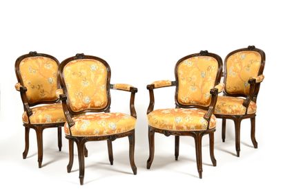 Suite of FOUR CABRIOLET CHAIRS in walnut...