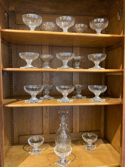  SET OF cut crystal glasses, square bases comprising: - Eighteen goblets - Seventeen...