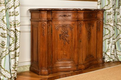  HUNTING KITCHEN in natural oak, moulded and carved with trophies symbolizing Autumn...